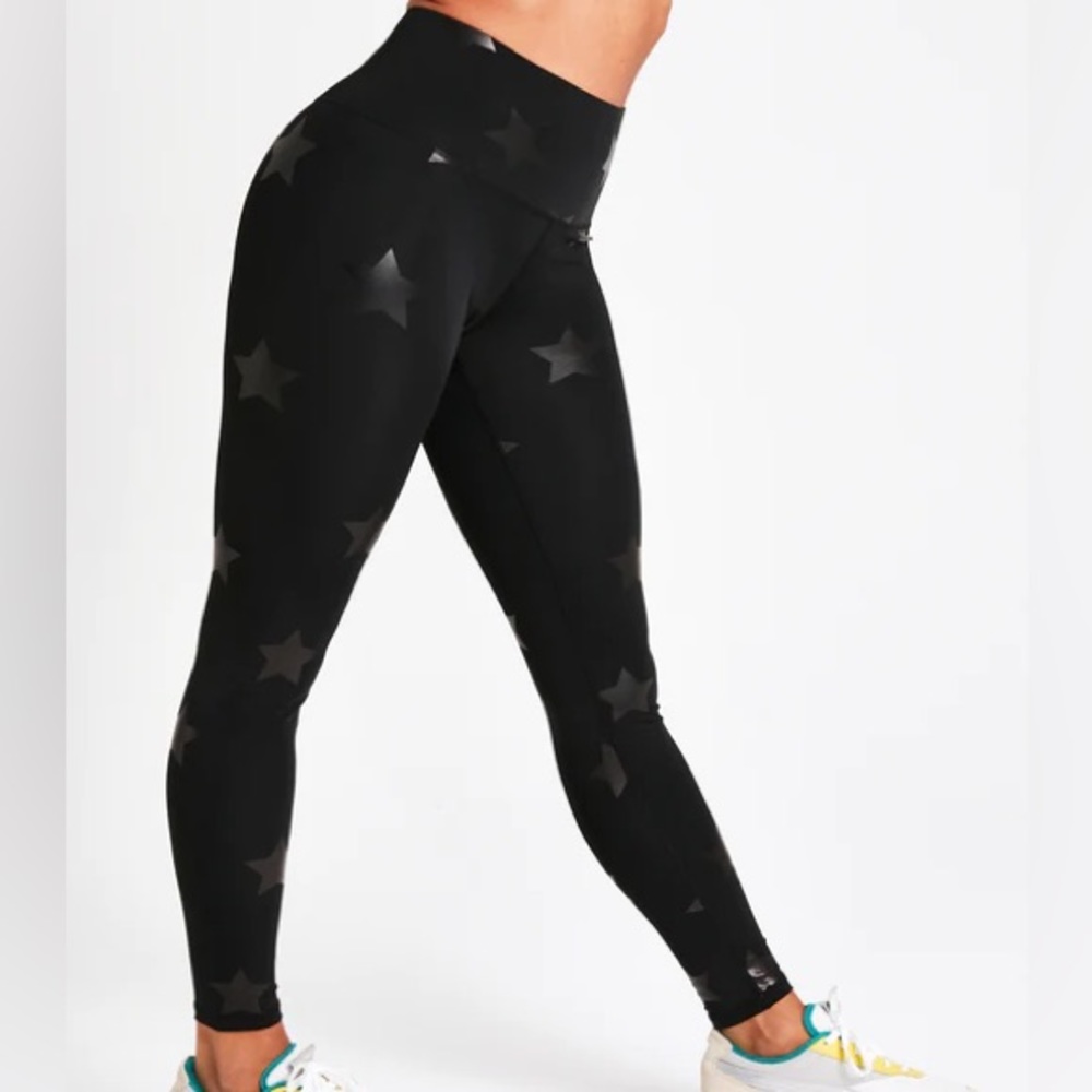 Terez Black Leggings in Star Foil Print. Size Small.